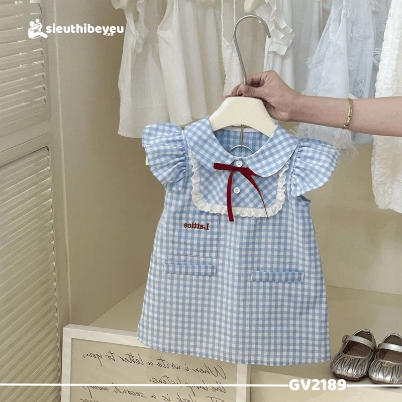 Váy Sọc Caro Chữ A Đính Nơ Xanh
